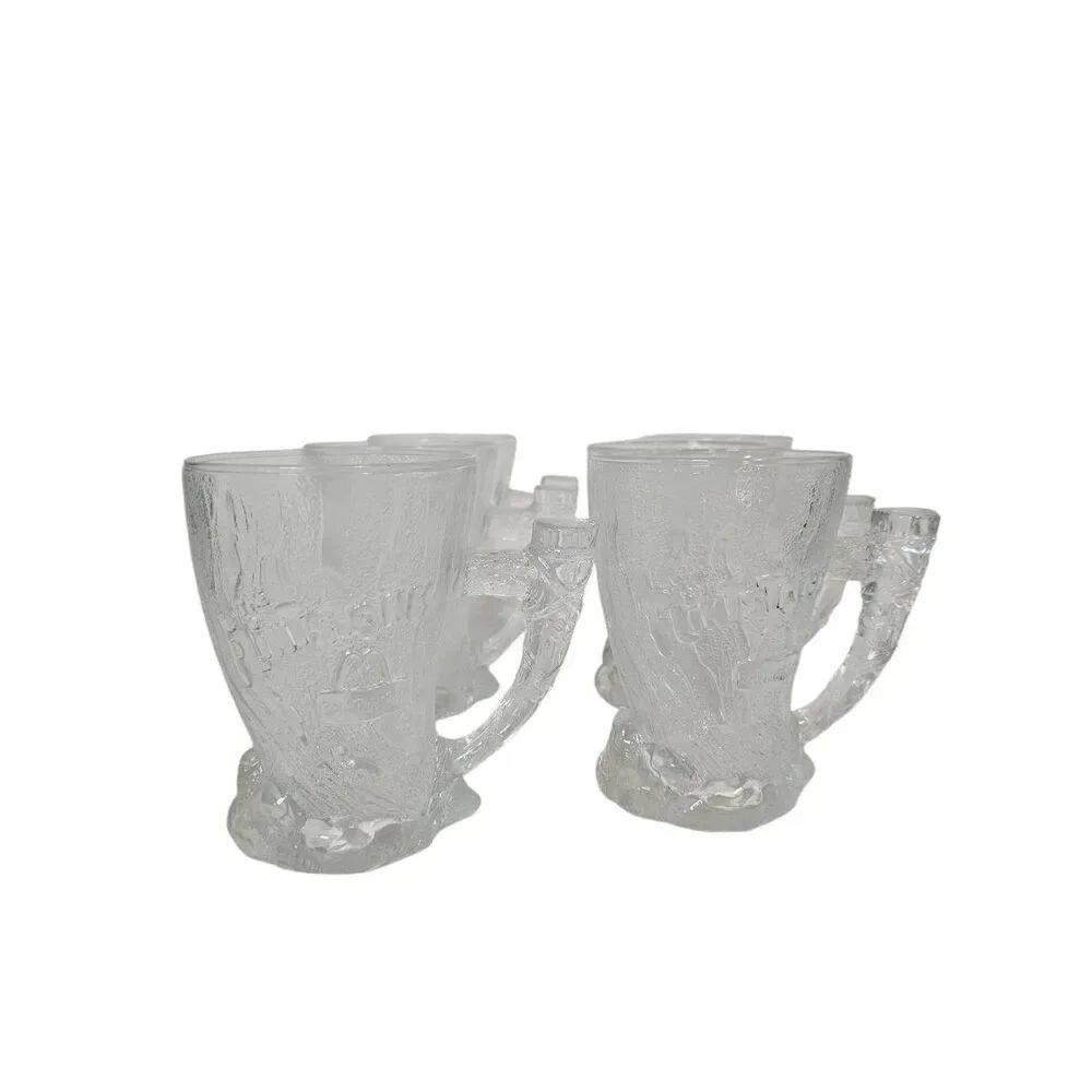 Set of 6 clear glass McDonald's Mammoth Mugs, 1993.